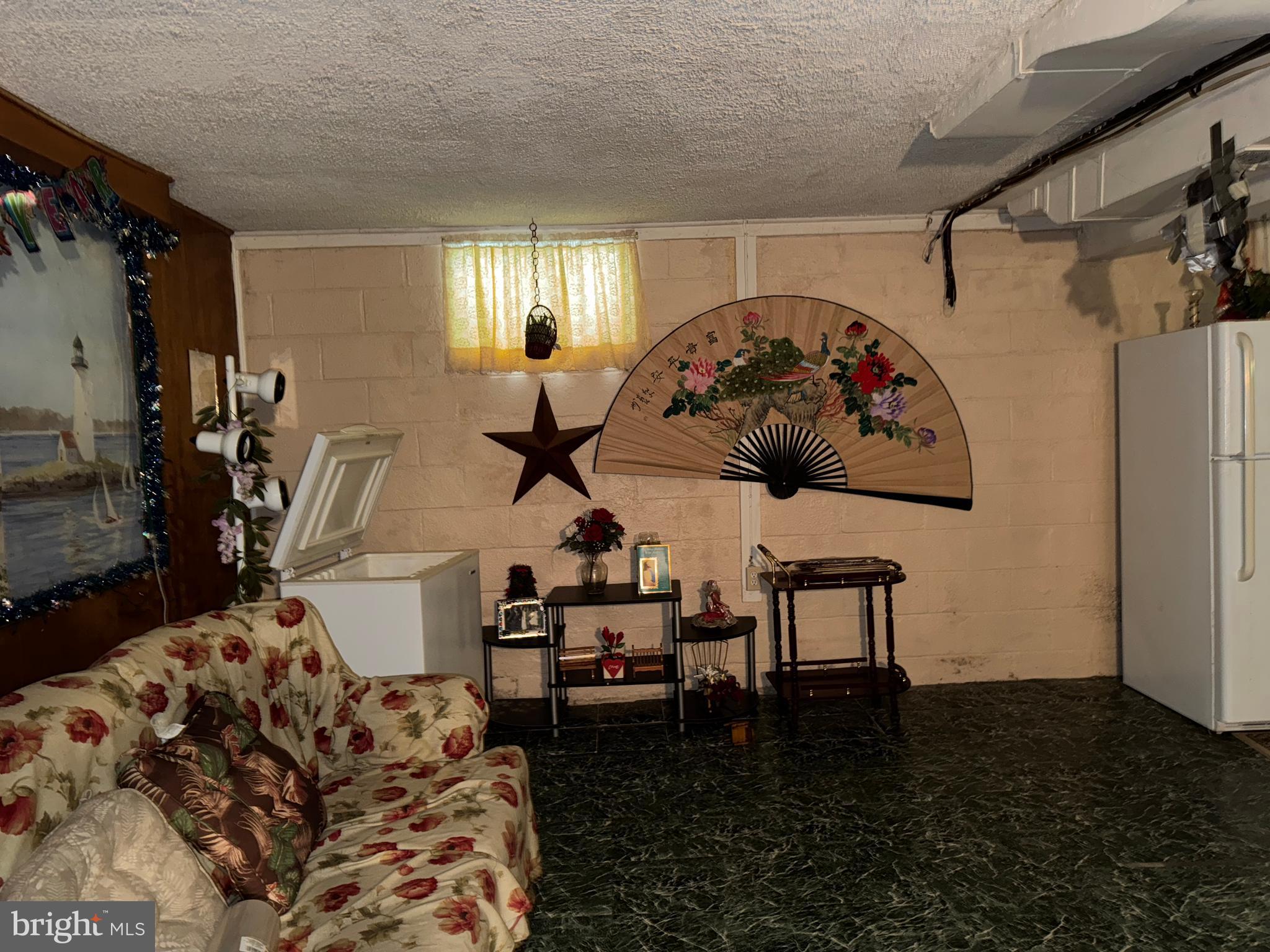 609 Evesham Avenue West Magnolia, NJ 08049 - Photo 59 of 73 a view of a livingroom with furniture and a window