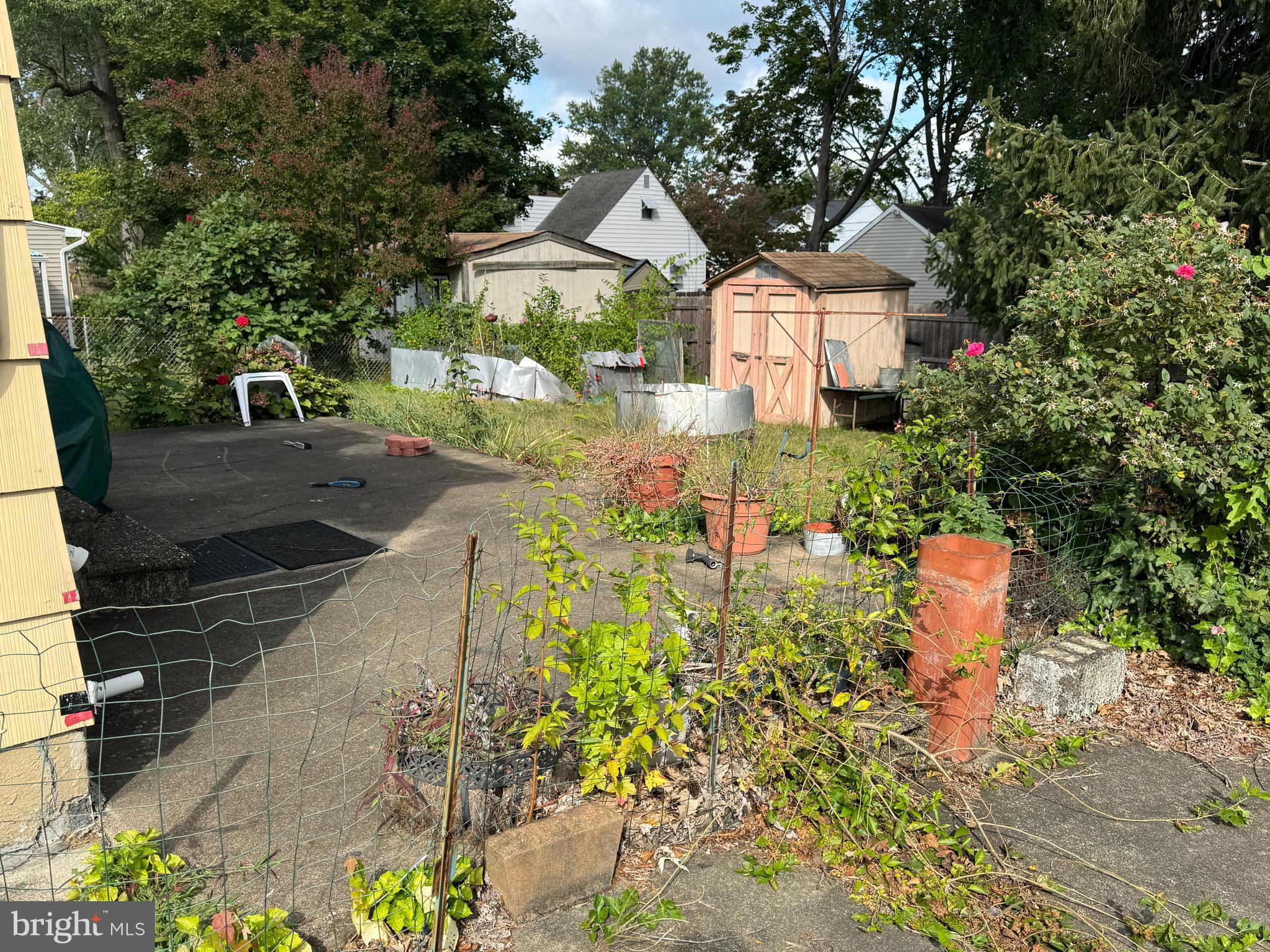 609 Evesham Avenue West Magnolia, NJ 08049 - Photo 9 of 73 a front view of a house with a yard