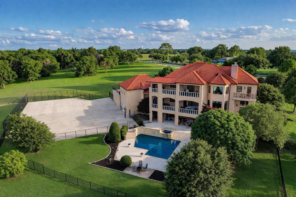 323 Kings Court Forney, TX 75126 - Photo 1 of 1 a aerial view of a house with yard and green space