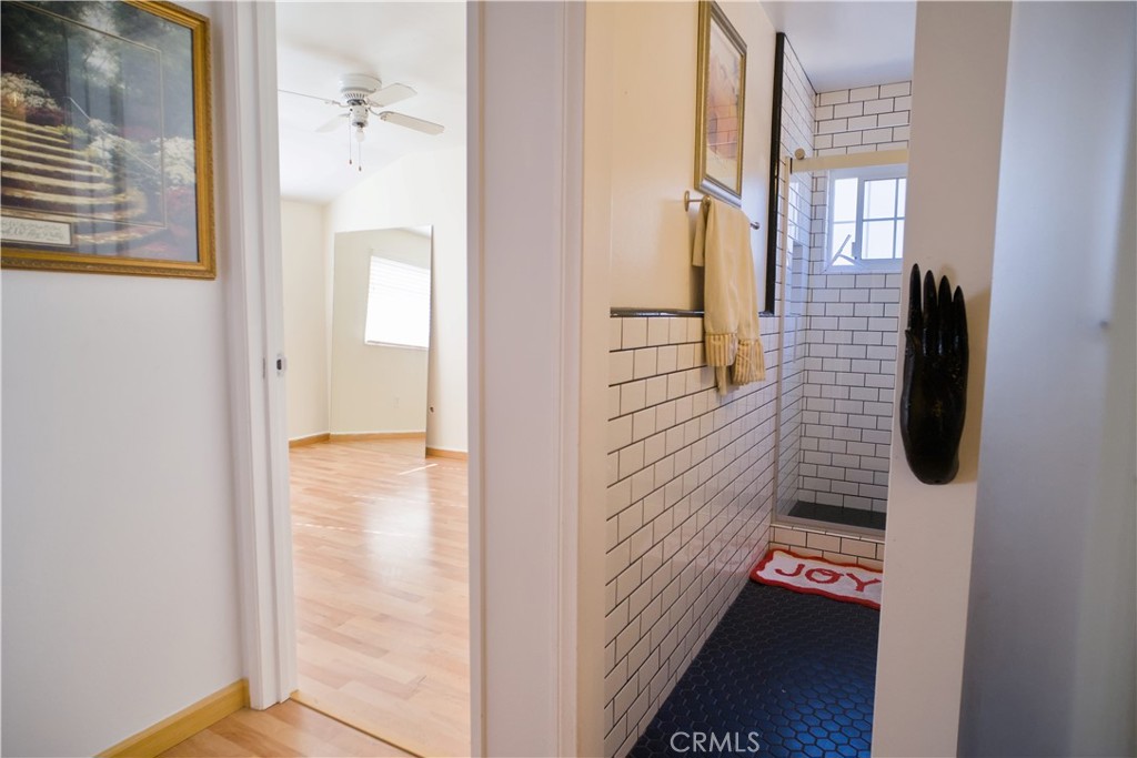 1312 Durham Street Simi Valley, CA 93065 - Photo 9 of 10 a view of a hallway with wooden floor and windows