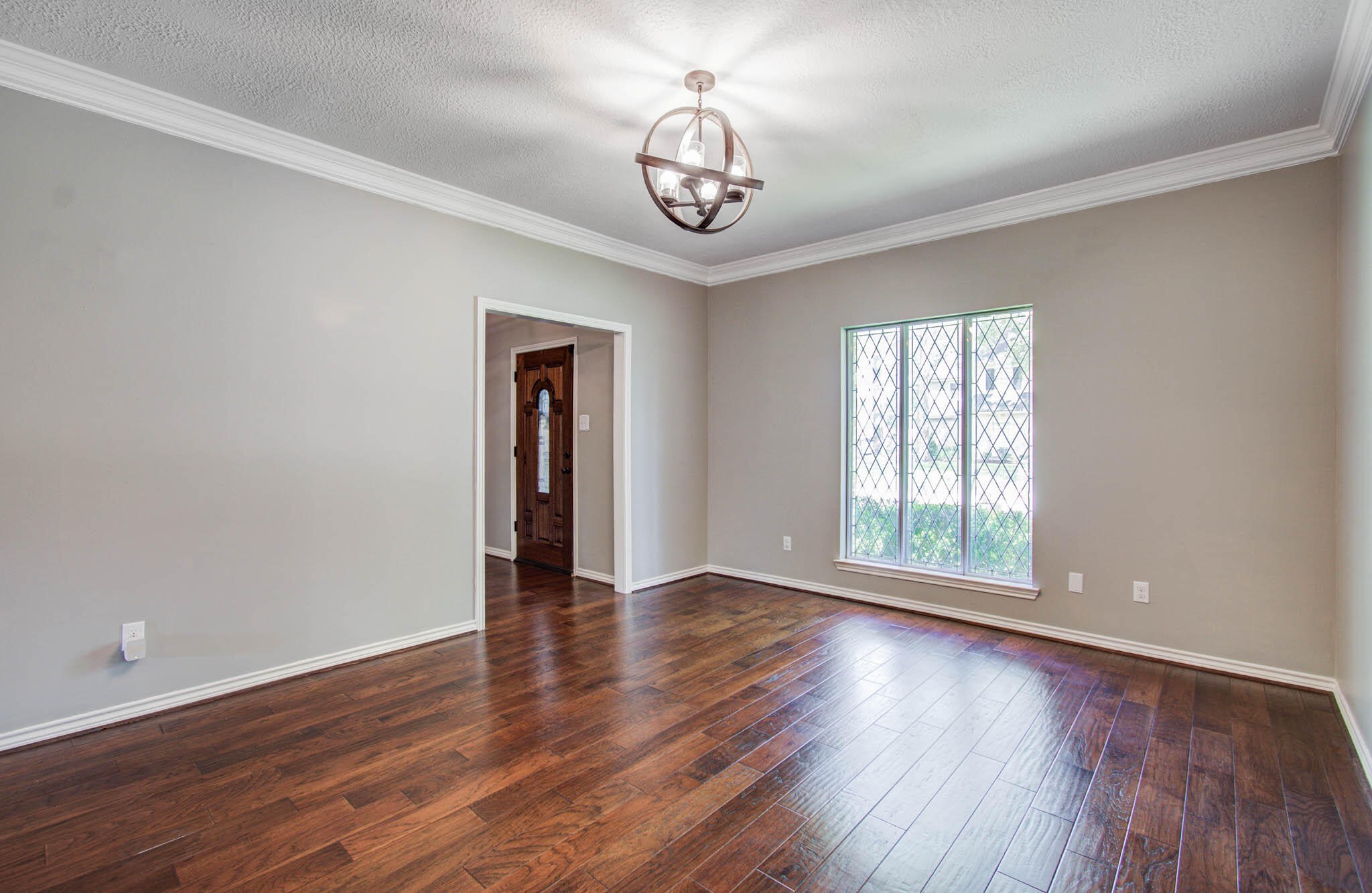 16267 Salmon Lane Spring, TX 77379 - Photo 11 of 48 a view of an empty room with wooden floor and a window