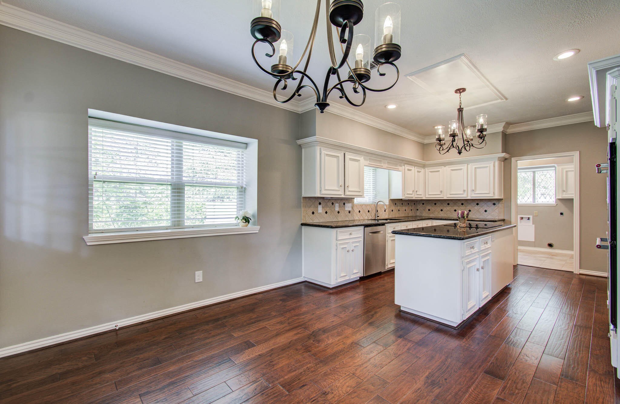 16267 Salmon Lane Spring, TX 77379 - Photo 16 of 48 a kitchen with a counter space a sink appliances and a window