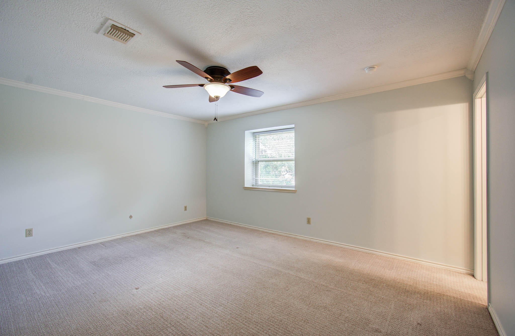 16267 Salmon Lane Spring, TX 77379 - Photo 41 of 48 an empty room with a window and a fan