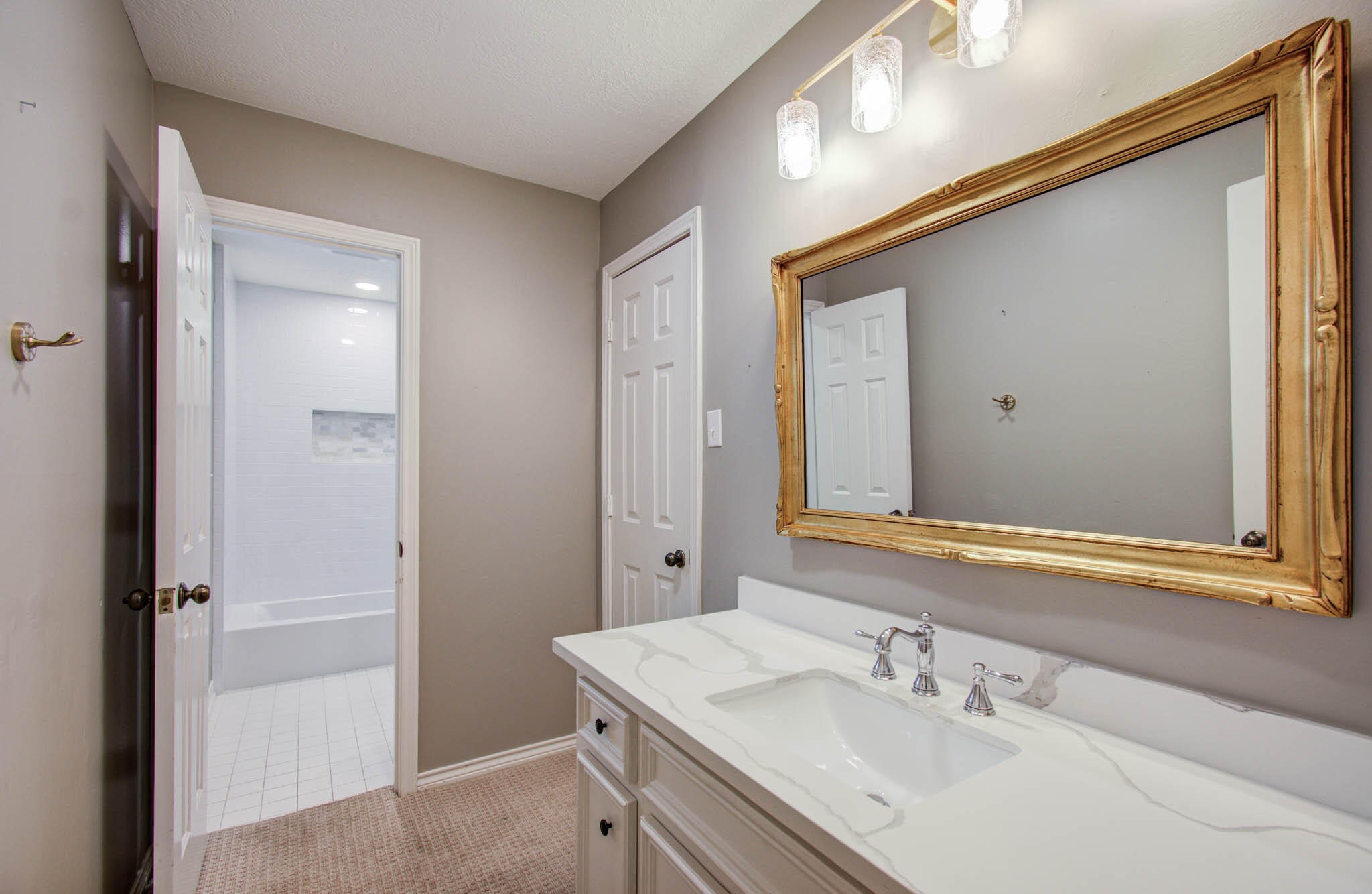 16267 Salmon Lane Spring, TX 77379 - Photo 43 of 48 a bathroom with a sink and a mirror