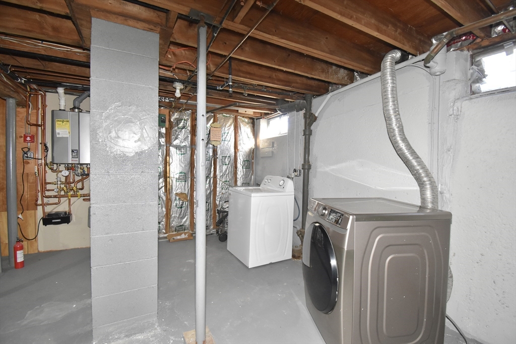 85 Orchard Street Chicopee, MA 01013 - Photo 27 of 33 a view of a storage and utility room