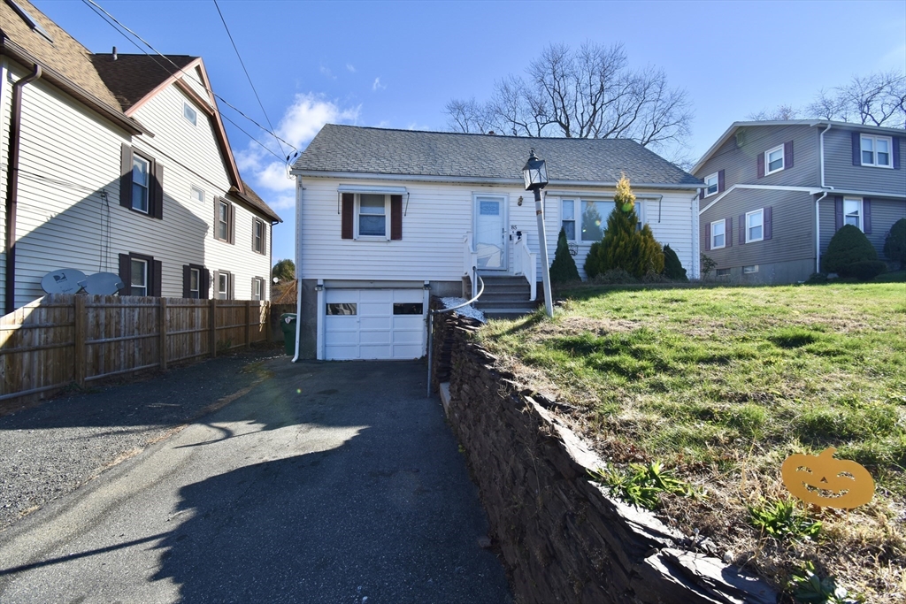 85 Orchard Street Chicopee, MA 01013 - Photo 30 of 33 a view of a house with a yard