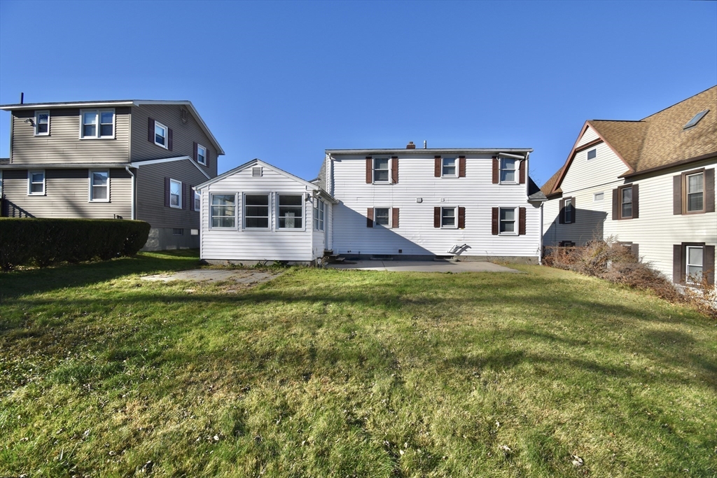 85 Orchard Street Chicopee, MA 01013 - Photo 33 of 33 a front view of a house with a yard