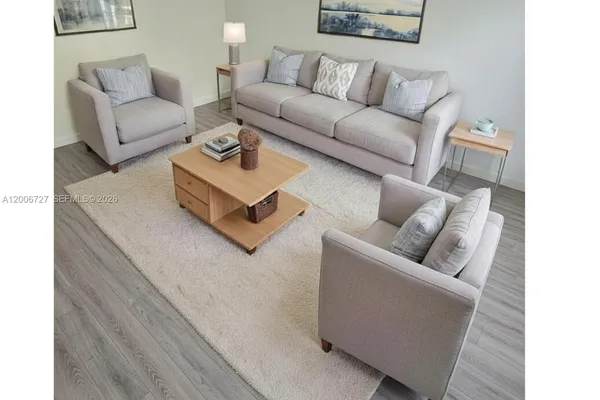 a living room with furniture and a couch