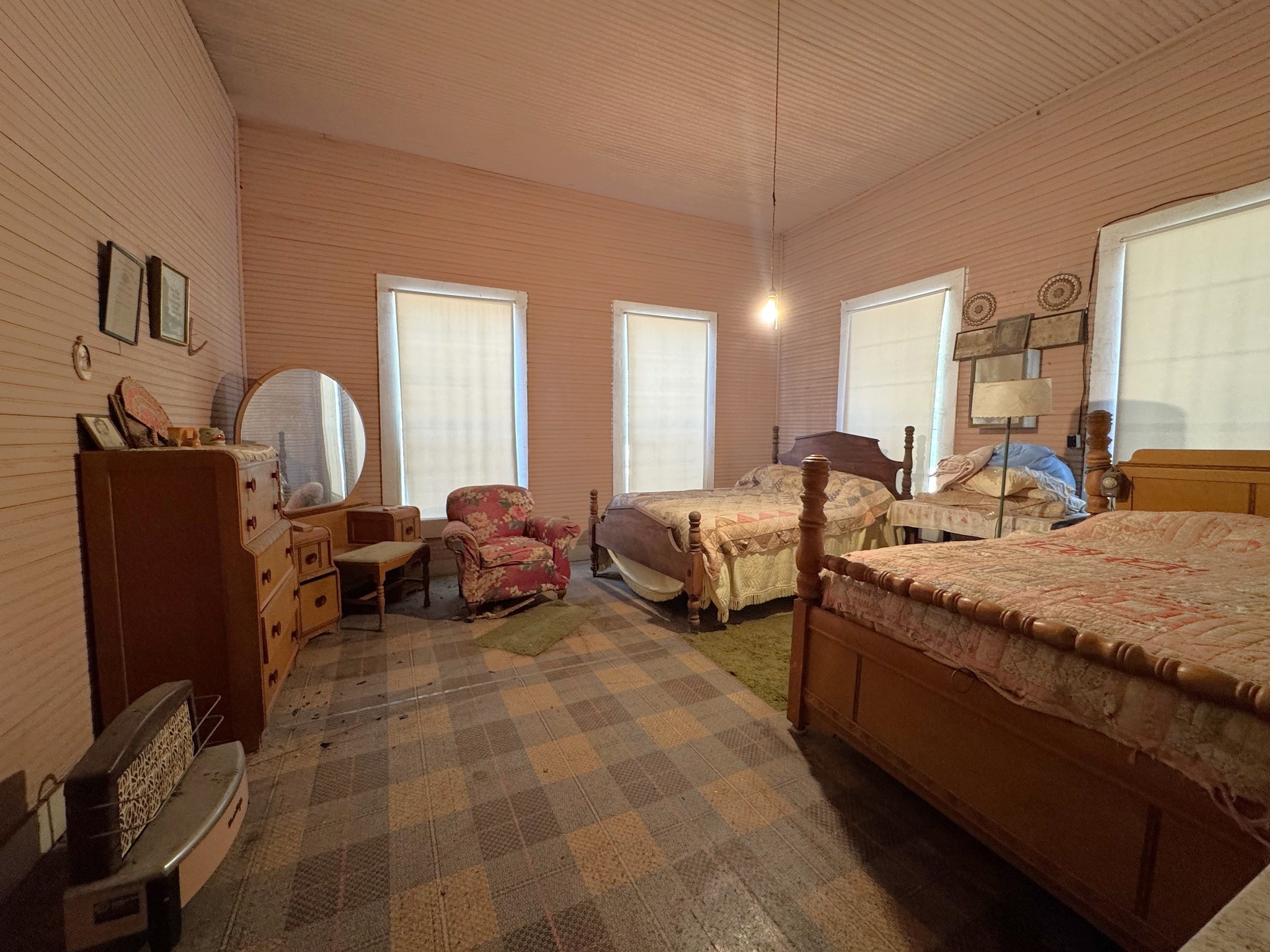 Tbd South Pitzer Street Colmesneil, TX 75938 - Photo 20 of 43 a large bedroom with bed and window