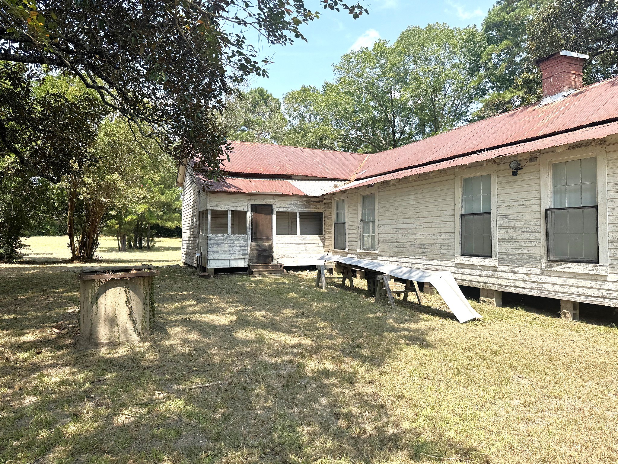 Tbd South Pitzer Street Colmesneil, TX 75938 - Photo 30 of 43 a house view with a outdoor seating space