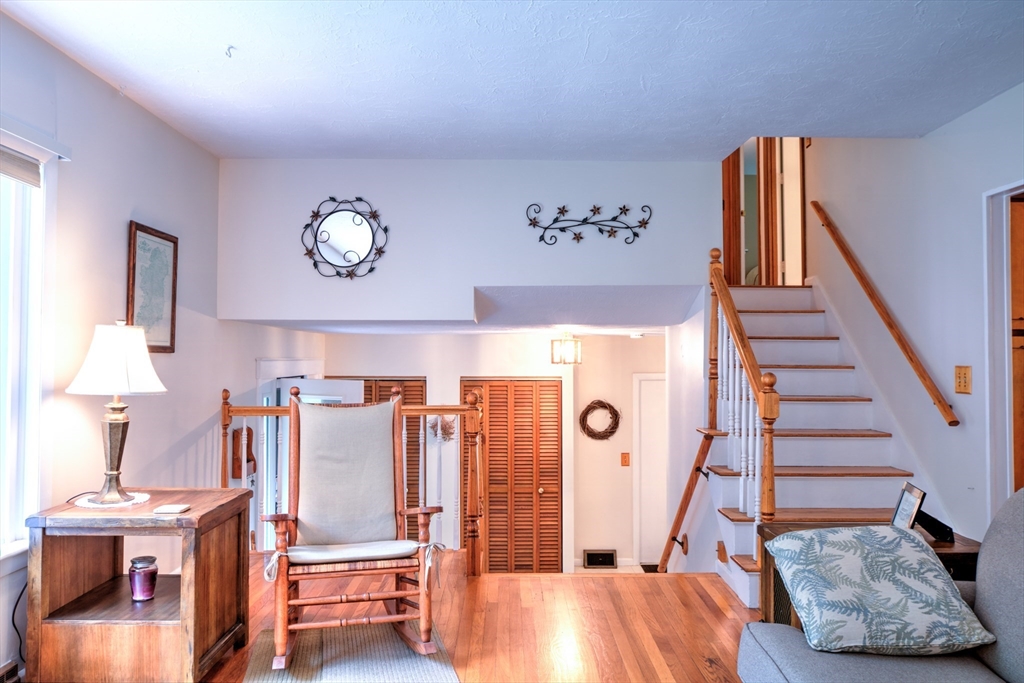 10 Long Meadow Road Chelmsford, MA 01824 - Photo 11 of 42 a view of hall way with furniture and stairs