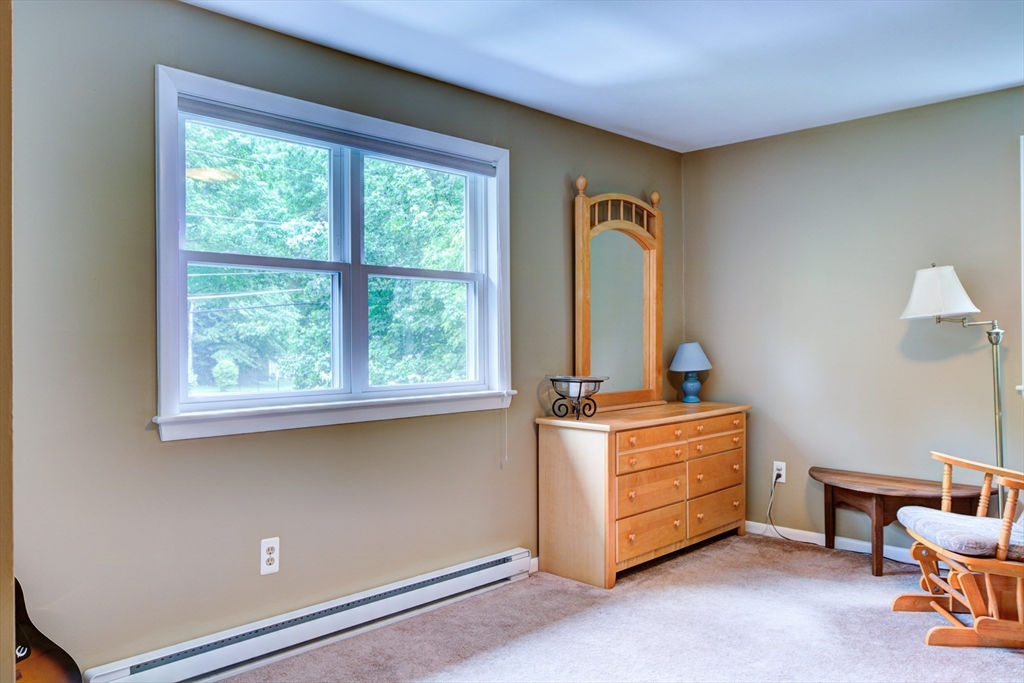 10 Long Meadow Road Chelmsford, MA 01824 - Photo 19 of 42 a living room with furniture and a window