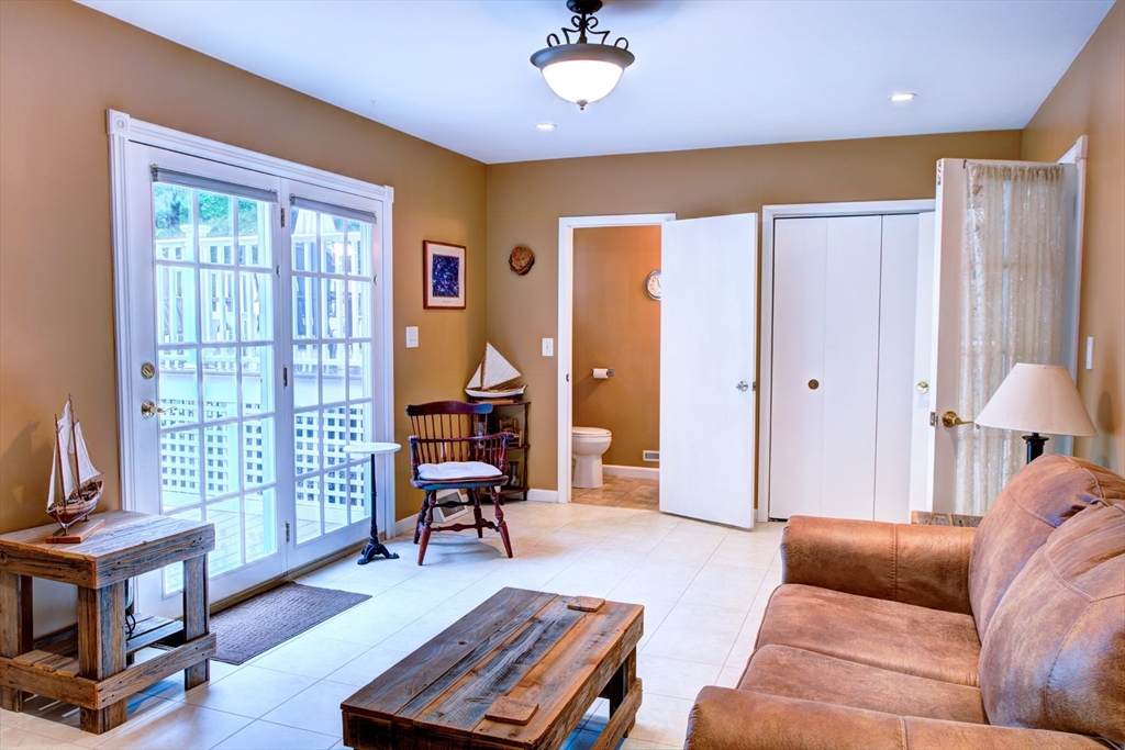10 Long Meadow Road Chelmsford, MA 01824 - Photo 23 of 42 a living room with furniture and a window