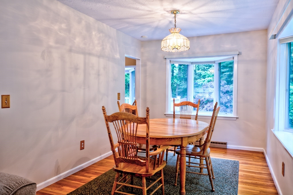 10 Long Meadow Road Chelmsford, MA 01824 - Photo 4 of 42 a dining room with furniture and window