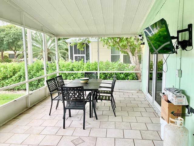 818 South Emerald Drive Key Largo, FL 33037 - Photo 2 of 44 FRONT SCREENED PORCH