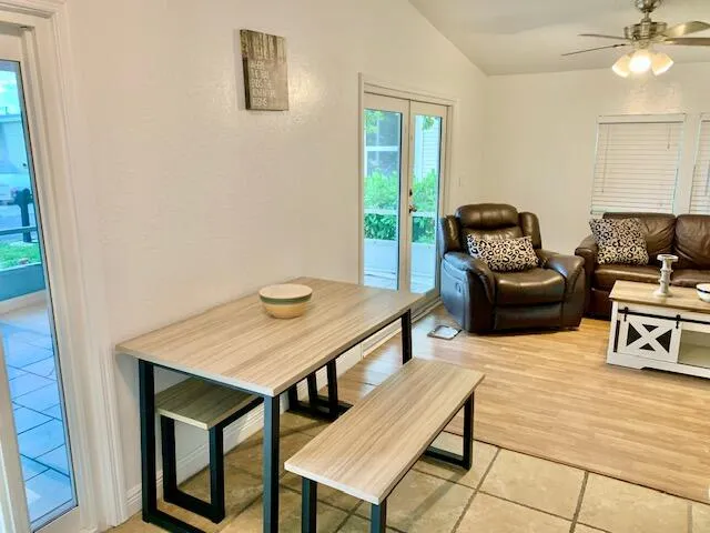 a bedroom with a bed and cabinet