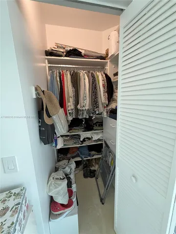 a workspace with furniture and a window