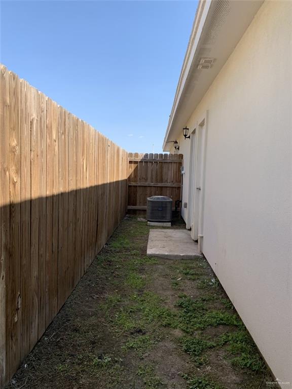 420 Teague Avenue, Unit 4 Edinburg, TX 78539 - Photo 13 of 14 a view of a backyard with wooden fence