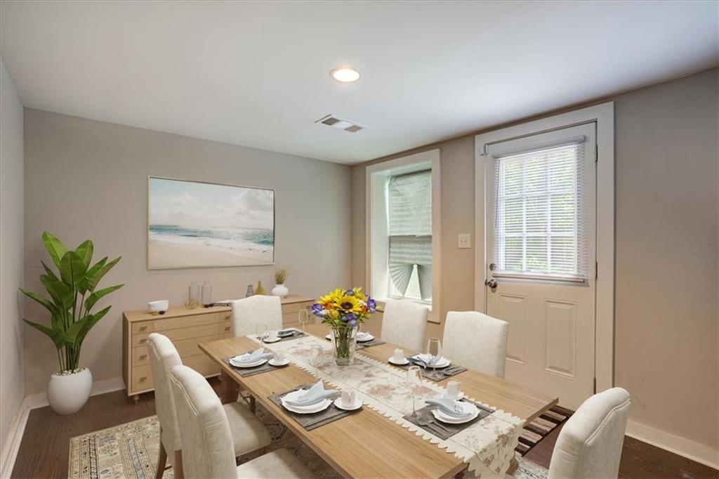 174 Rivertown Road Fairburn, GA 30213 - Photo 9 of 33 a view of a dining room with furniture window and outdoor space