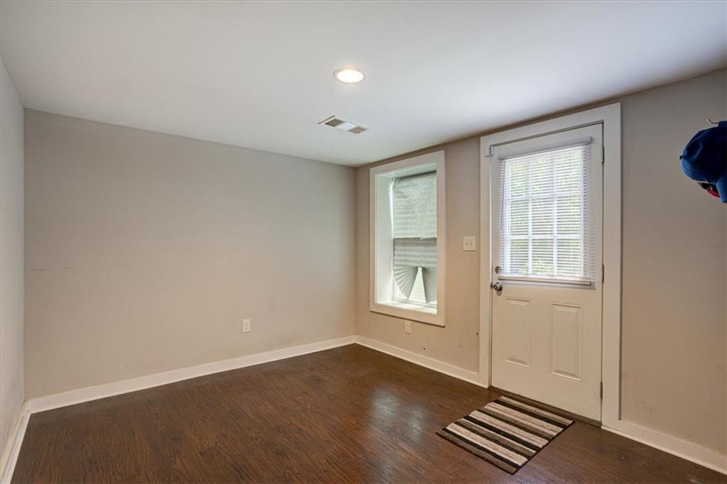 174 Rivertown Road Fairburn, GA 30213 - Photo 10 of 33 an empty room with windows