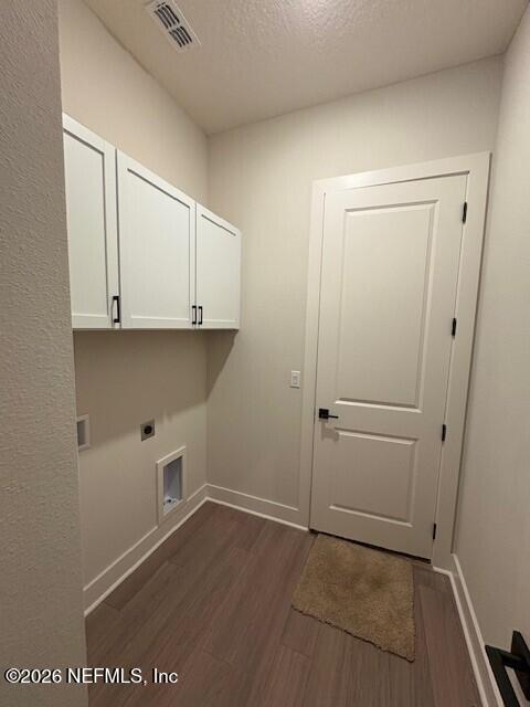 8463 Ford Road Bryceville, FL 32009 - Photo 11 of 14 a view of cabinets and wooden floor