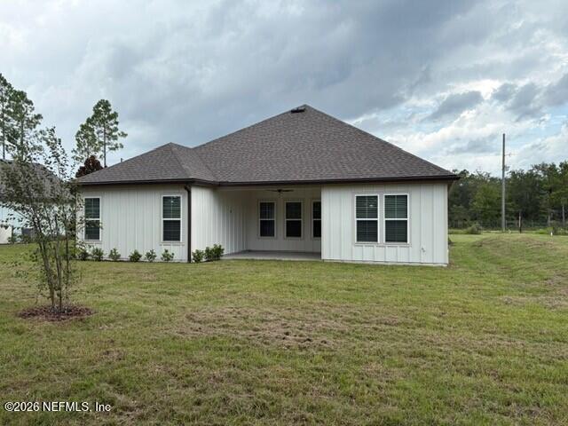 8463 Ford Road Bryceville, FL 32009 - Photo 13 of 14 a front view of a house with a garden