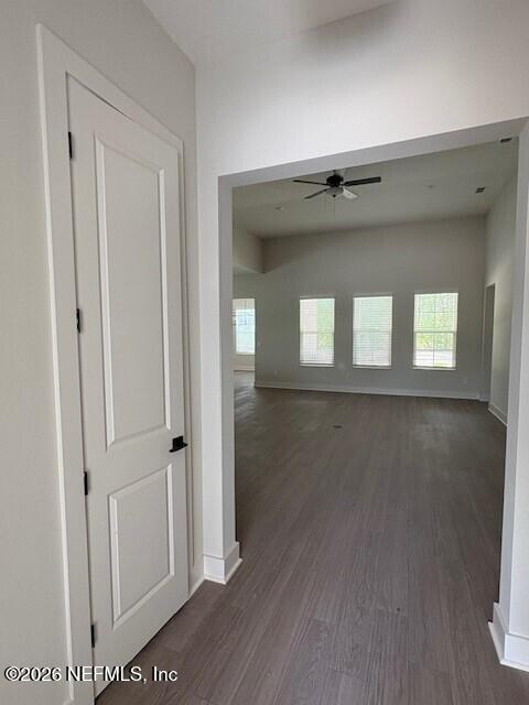8463 Ford Road Bryceville, FL 32009 - Photo 2 of 14 a view of a hallway with wooden floor and a cabinet