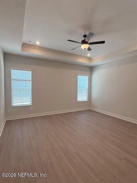 8463 Ford Road Bryceville, FL 32009 - Photo 6 of 14 an empty room with windows and fan