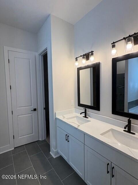 8463 Ford Road Bryceville, FL 32009 - Photo 7 of 14 a bathroom with double sink and a mirror