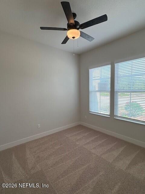 8463 Ford Road Bryceville, FL 32009 - Photo 9 of 14 an empty room with a window