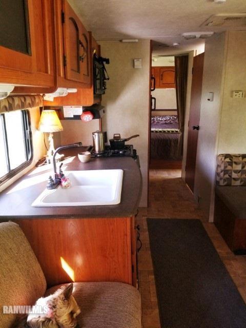 13767 3 Mile Road Savanna, IL 61074 - Photo 4 of 17 a bathroom with a sink and a mirror
