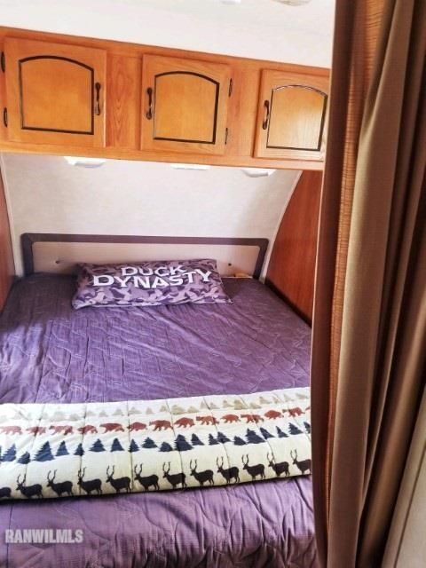 13767 3 Mile Road Savanna, IL 61074 - Photo 7 of 17 a view of a room with wooden floor