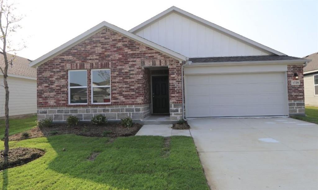 1720 Arroyo Road Crandall, TX 75114 - Photo 1 of 1 a front view of a house with a yard and garage