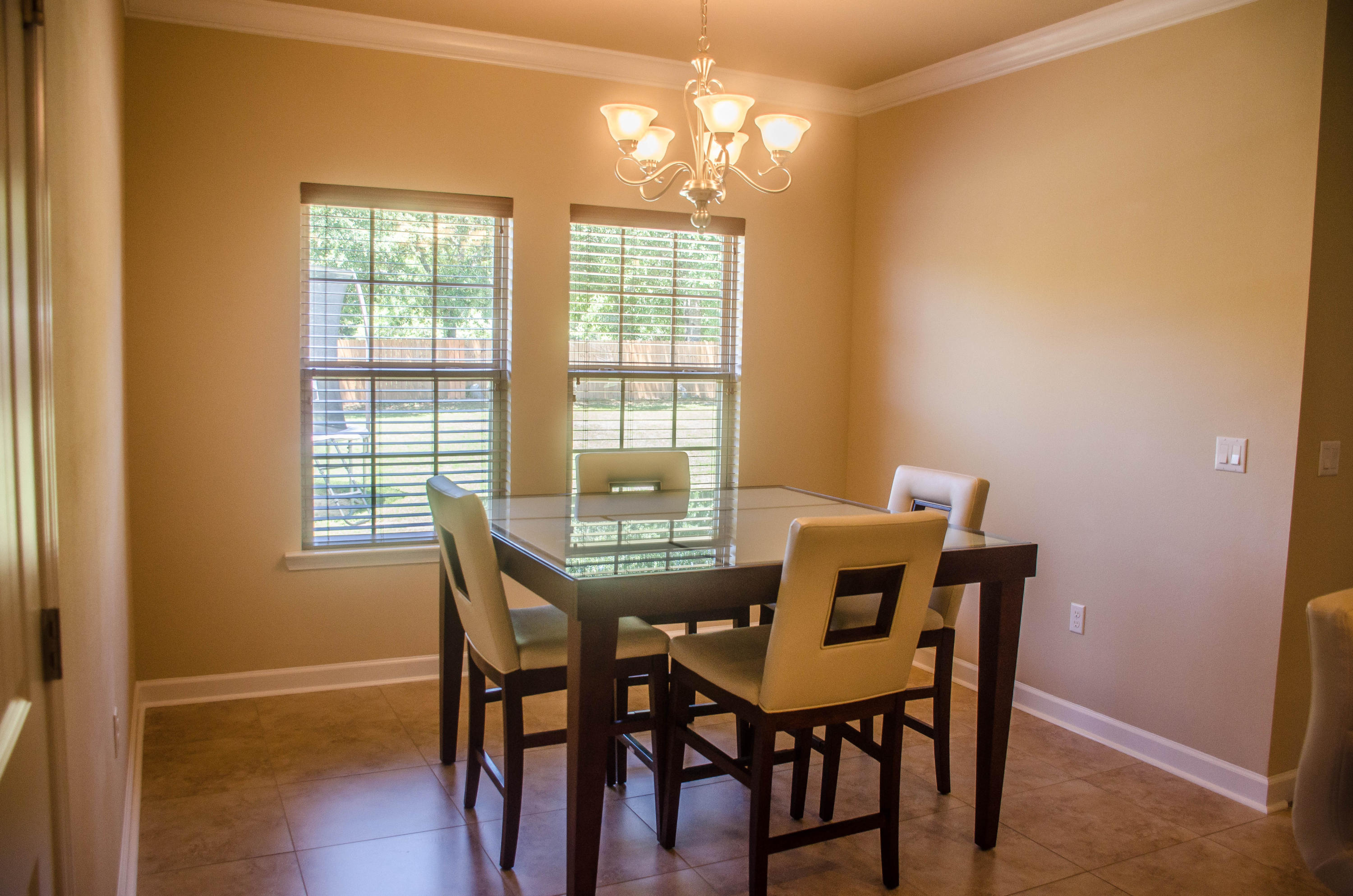 5184 Rabbit Crestview, FL 32539 - Photo 12 of 31 a view of a dining room with furniture and window