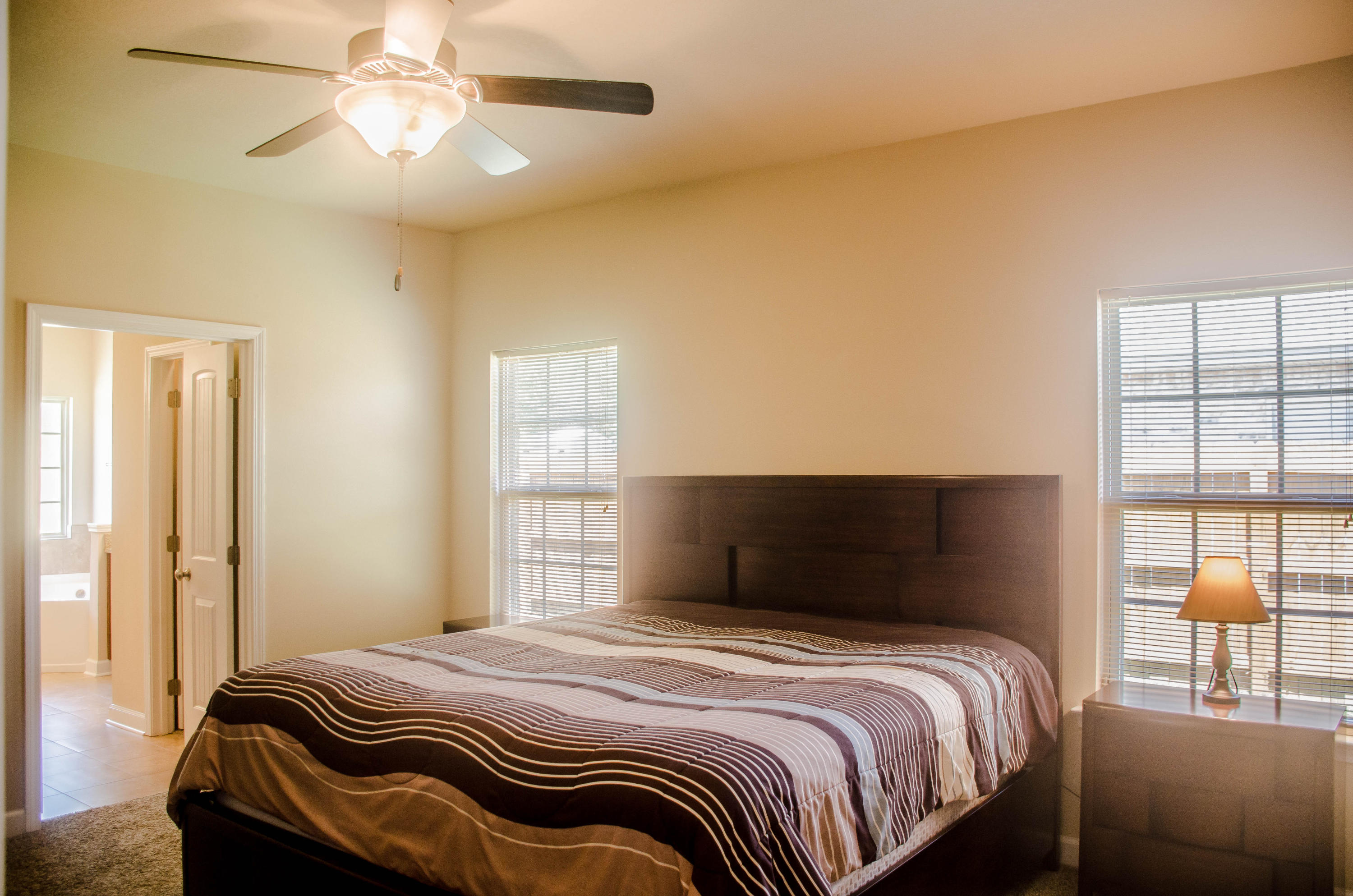 5184 Rabbit Crestview, FL 32539 - Photo 17 of 31 a bedroom with a bed and wooden floor