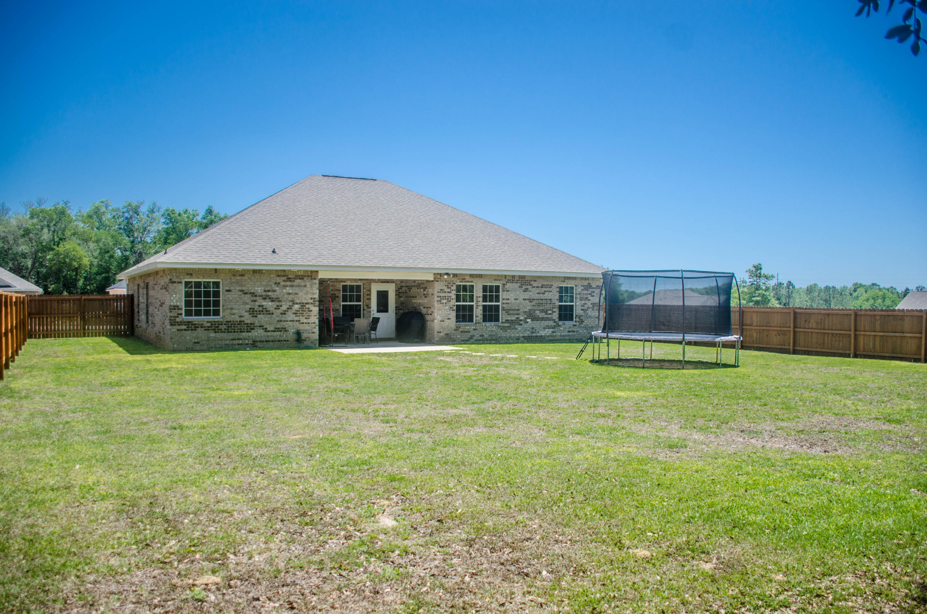 5184 Rabbit Crestview, FL 32539 - Photo 27 of 31 a front view of a house with a garden