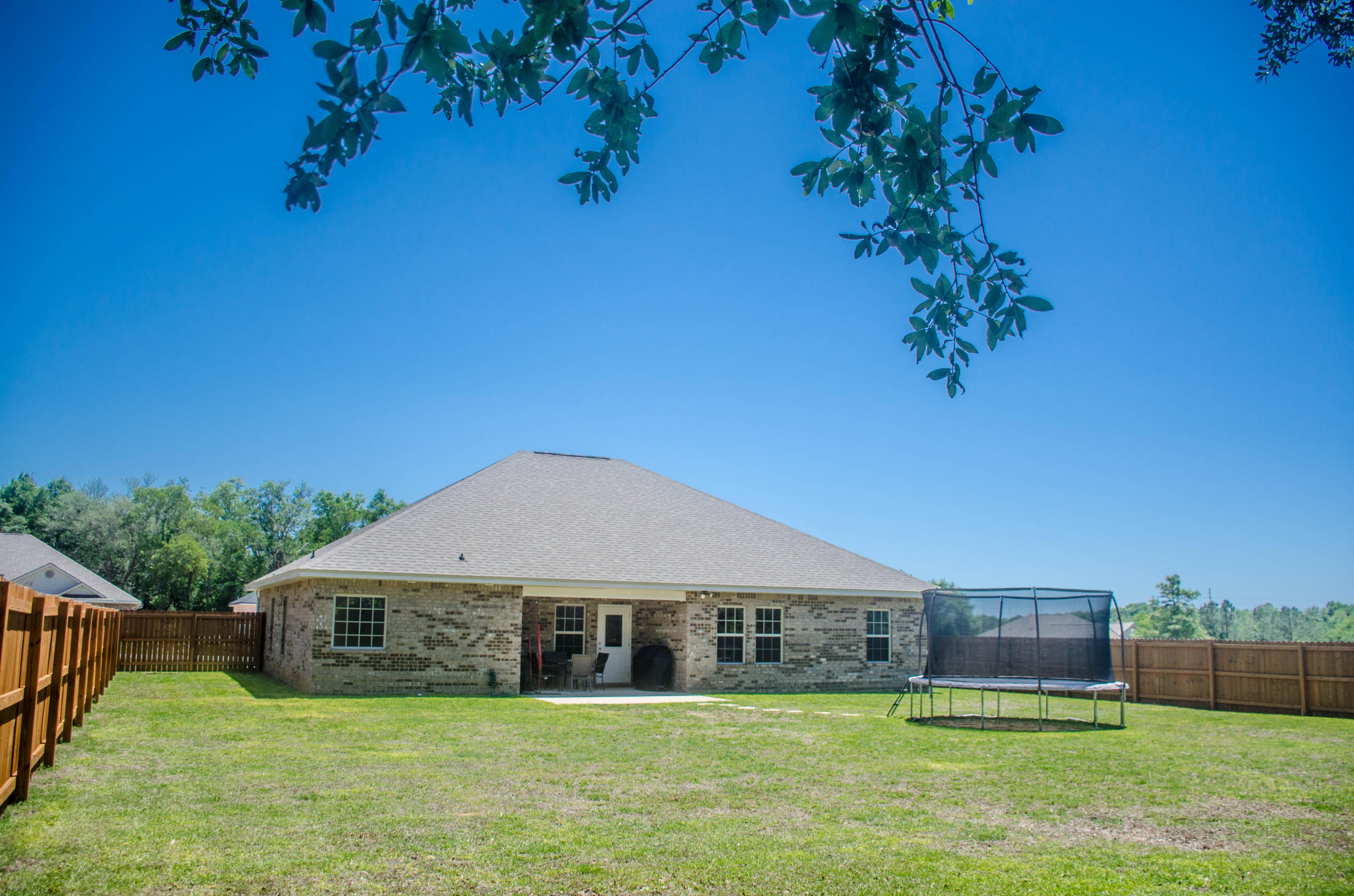 5184 Rabbit Crestview, FL 32539 - Photo 28 of 31 a view of a house with a yard