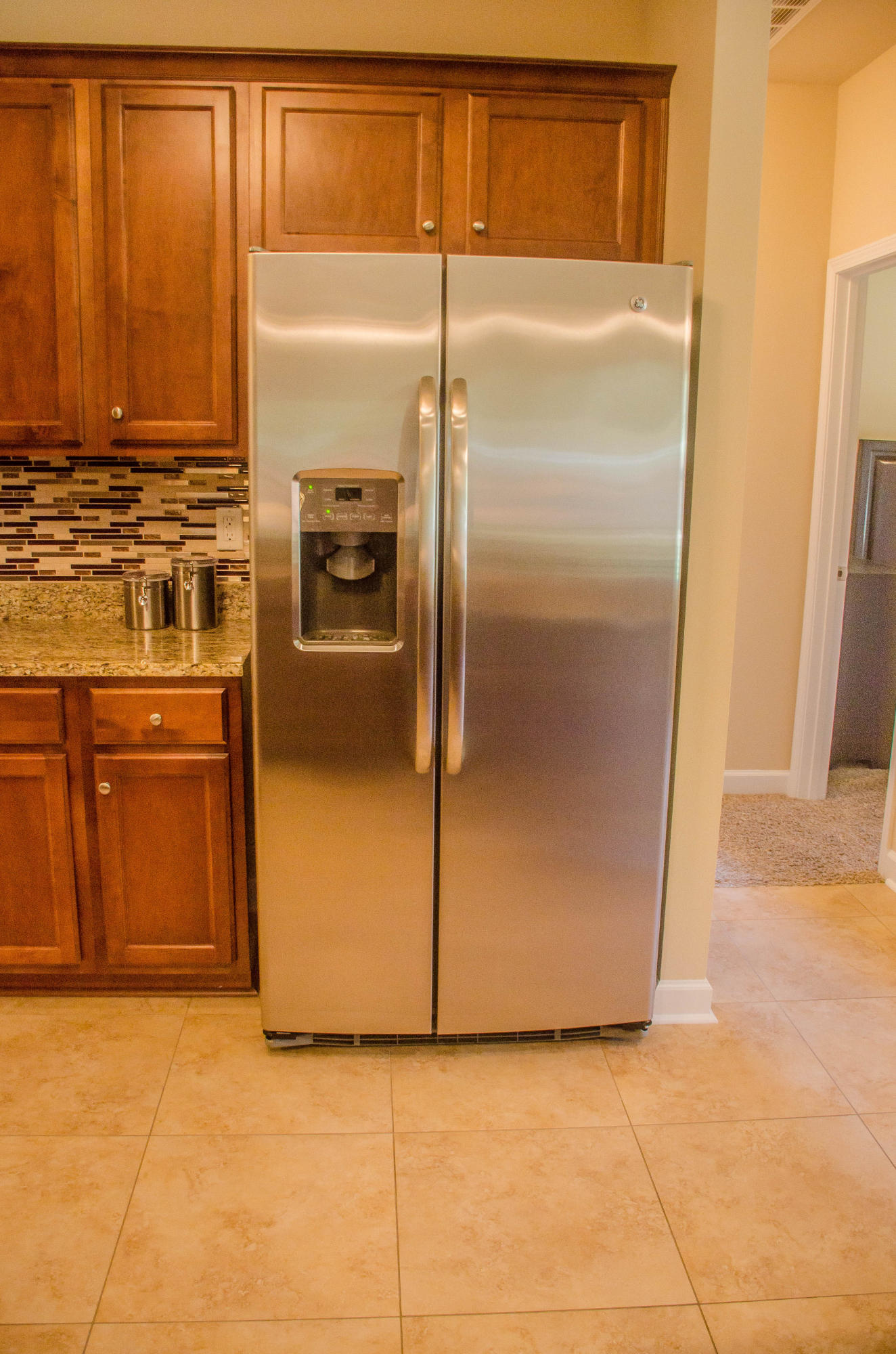 5184 Rabbit Crestview, FL 32539 - Photo 9 of 31 a kitchen with a refrigerator