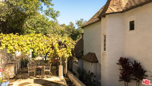 a backyard of a house with lots of green space