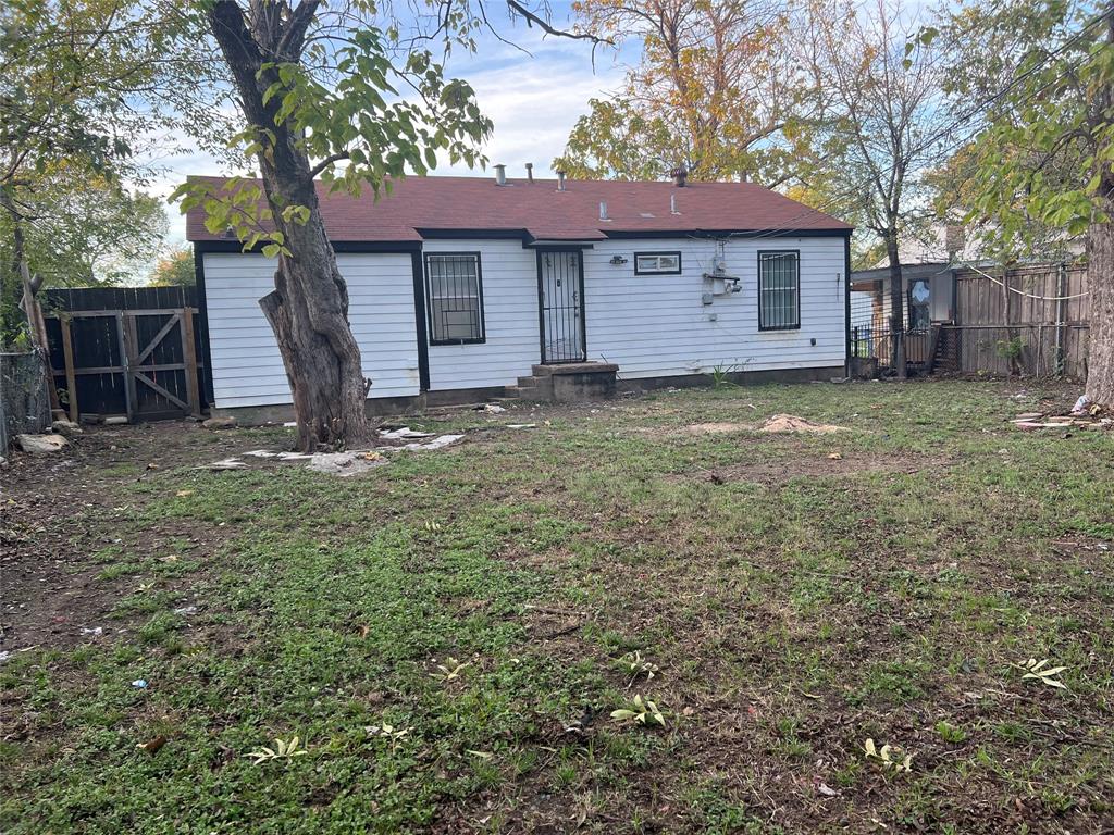 2722 Locust Avenue Dallas, TX 75216 - Photo 20 of 20 a view of a house with a yard