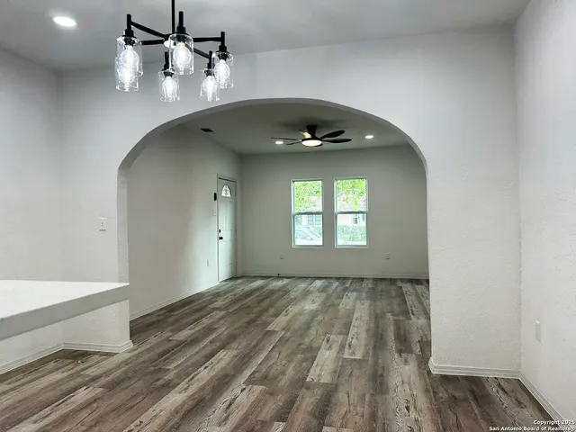 a view of an empty room and window