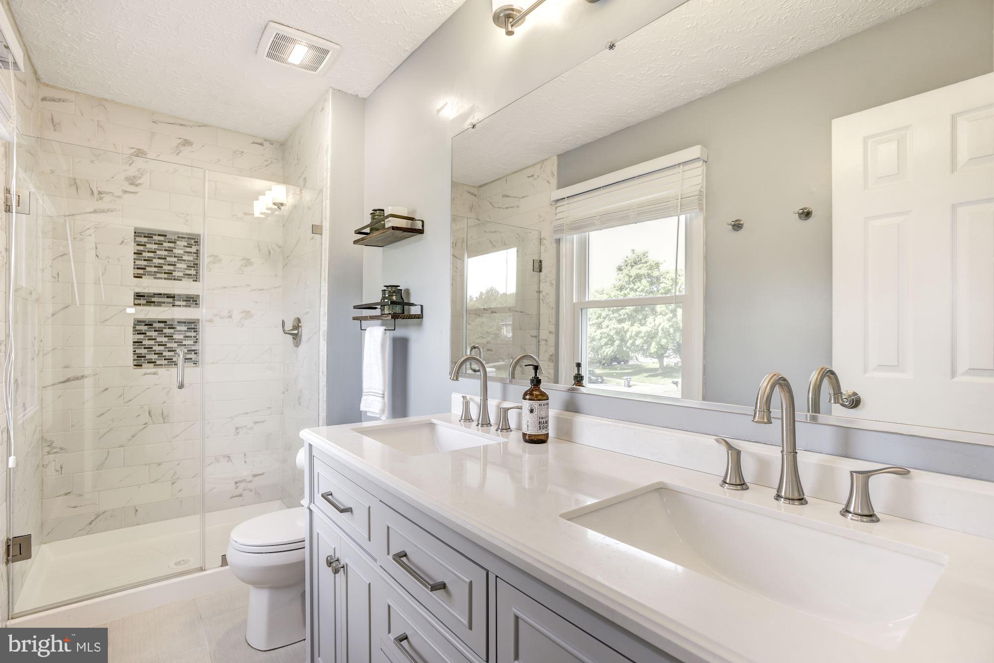 2233 Halter Lane Reston, VA 20191 - Photo 20 of 34 Remodeled master bath with glass shower