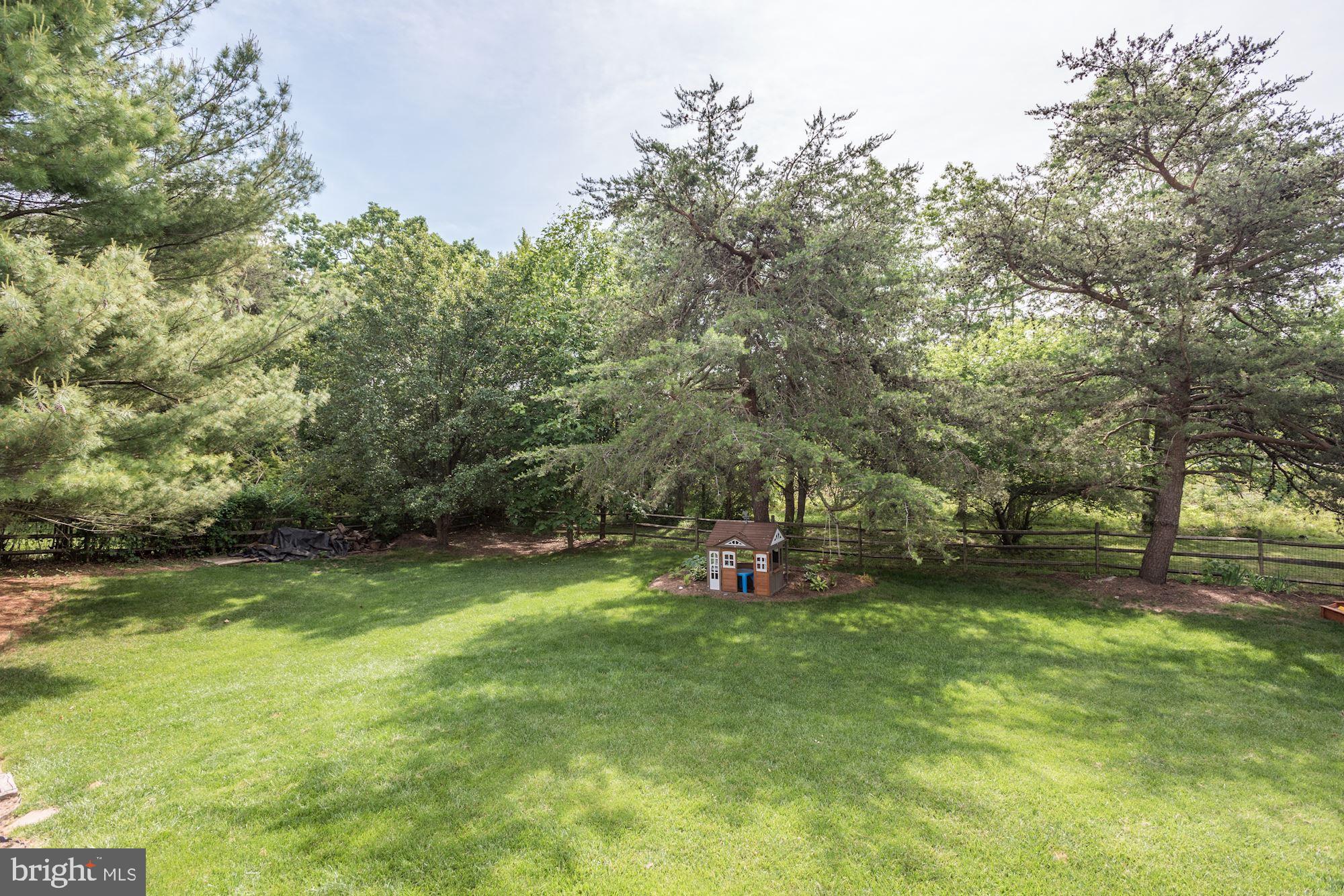 2233 Halter Lane Reston, VA 20191 - Photo 28 of 34 Flat, grassy, fenced-in back yard w/ mature trees