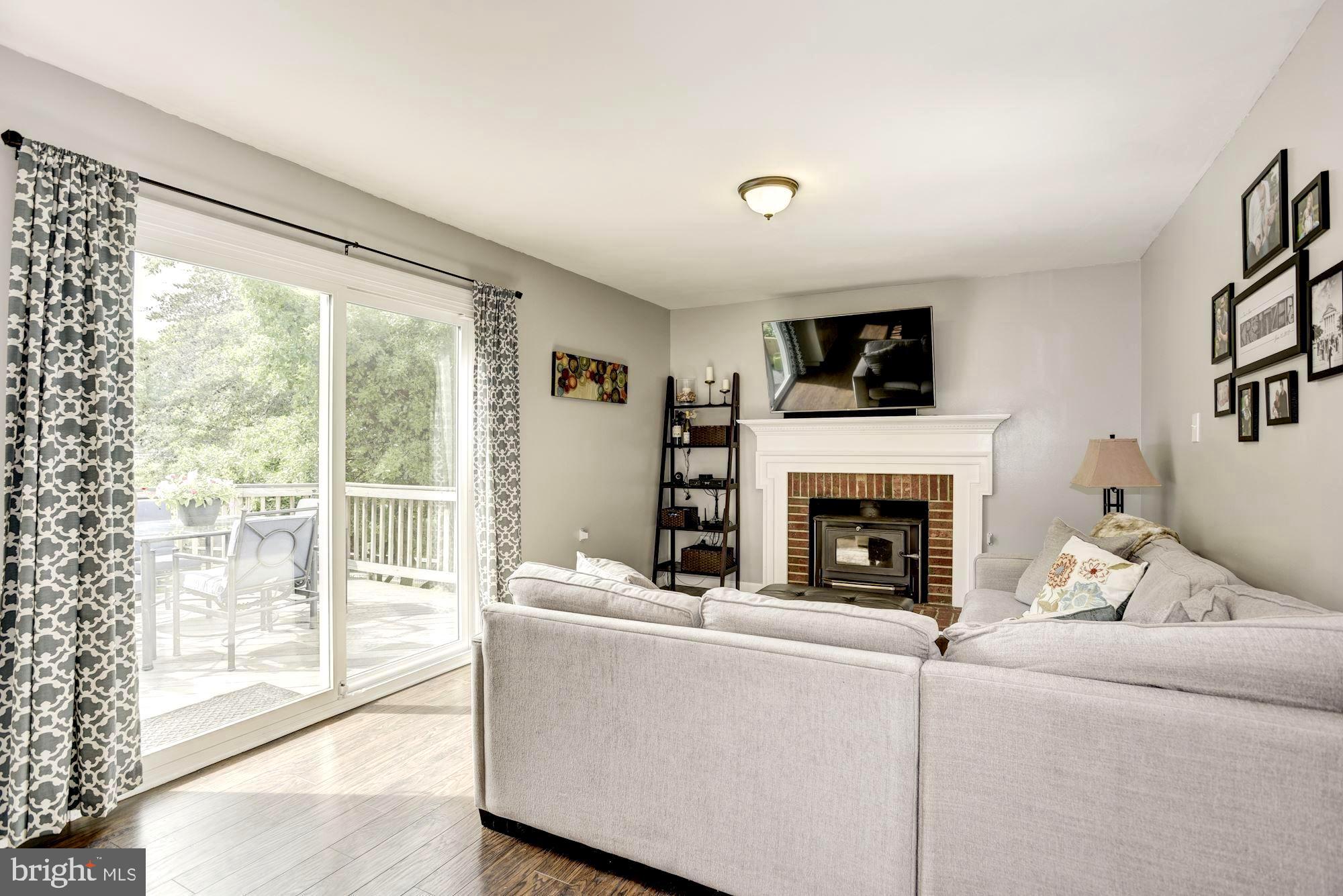 2233 Halter Lane Reston, VA 20191 - Photo 9 of 34 Comfortable family room leading to deck