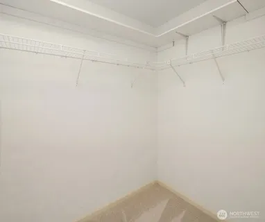 a view of a room with racks on the wall