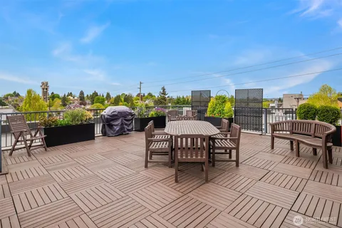 a view of a chairs and table on the terrace