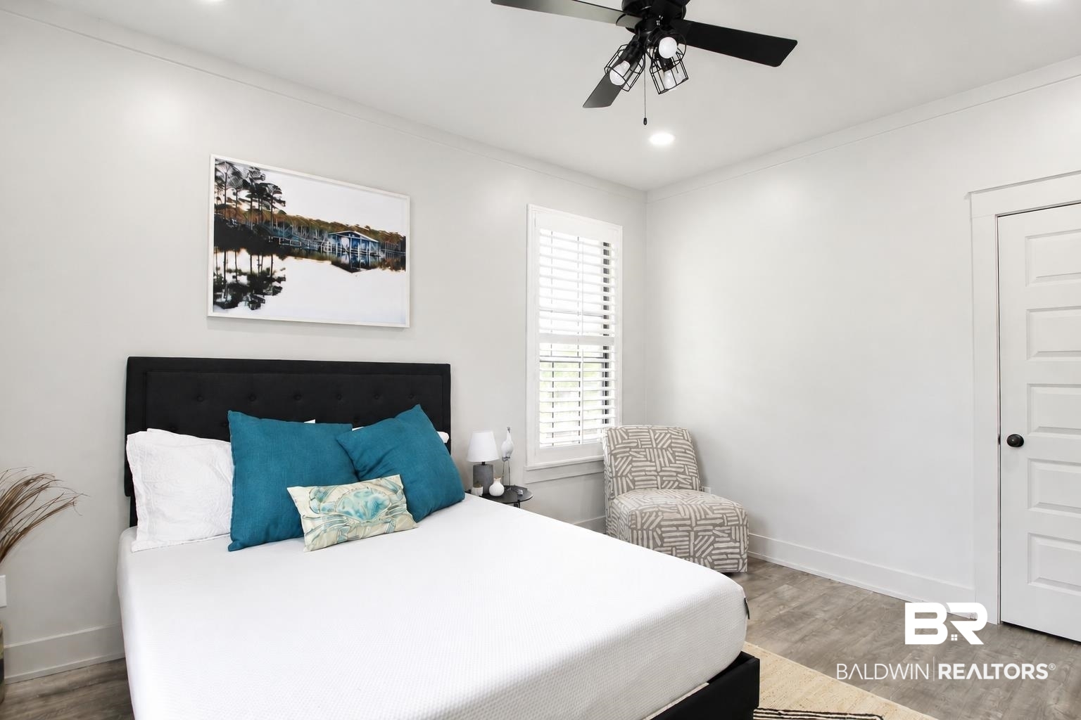 9825 Wolf Creek Ridge Elberta, AL 36530 - Photo 10 of 76 Spacious room featuring wood-finish flooring, recessed lighting, and a black ceiling fan with integrated lighting