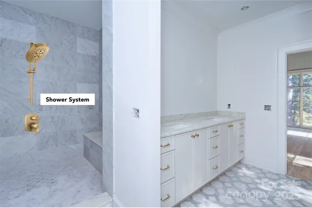 a white bath tub sitting in a en suite bathroom