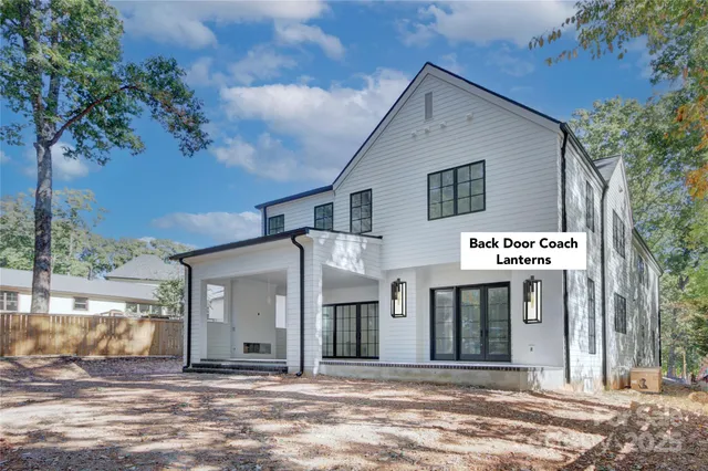 front view of a house with a trees