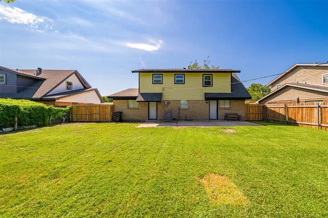 a view of yard with swimming pool
